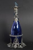 A Bristol Blue decanter in decorative gr
