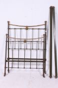 A Victorian brass and cast iron single b