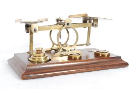A 19th century set of brass postal scale