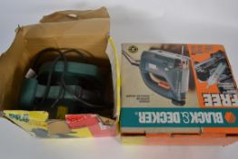 A boxed unused jigsaw together with an u