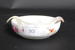 A Royal Crown Derby Tea Strainer and Bow