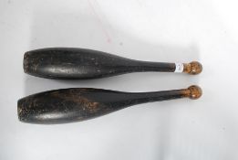 A pair of early 20th century jugglers ba