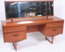 A retro teak sideboard.  H114cm x W156cm