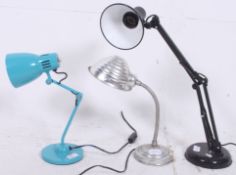 A collection of vintage anglepoise lamps