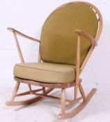 An Ercol beech and elm wood light tall b