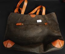 A ladies Bric's Tote leather satchel han