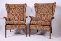 A pair of 20th century mahogany and velo