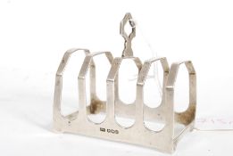 A silver hallmarked toast rack of small
