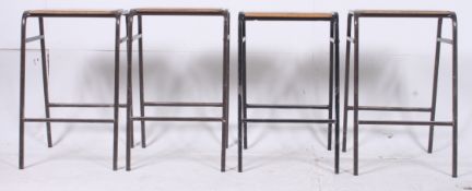 A set of 4 1950's stacking school / Indu