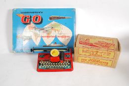 A boxed childrens Mettype tin plate type