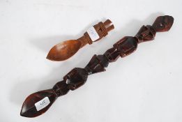 Two African wooden tribal spoons , one S