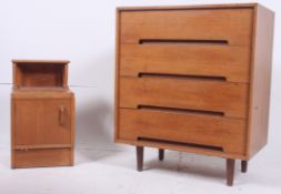 A retro oak chest of drawers having a se