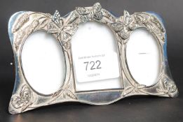 A silver plate picture frame with ditty