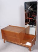 A 1940's oak drop centre dressing table