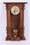 A large 19th century walnut Viennese reg