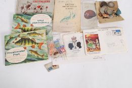 A mixed assortment of ephemera to includ