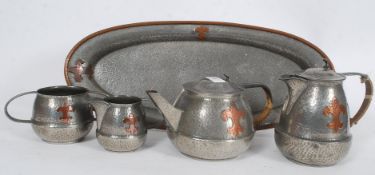 A 19th century Arts & Crafts pewter and