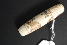 A bone needle case attached a thimble