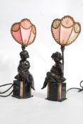 A pair of early 20th century bronze cloc