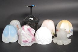 A collection of 8x vintage glass light /