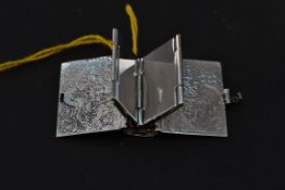 A 925 white metal (indicating silver ) b