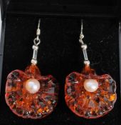 A pair of silver amber style and pearl d