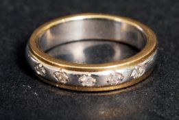 A 9k diamond wedding band, weight 5.2g,