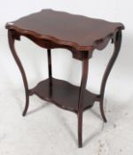 An Edwardian mahogany side table raised