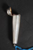 A white metal silver cigarette holder ca
