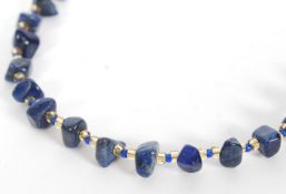 A Lapis Lazuli beaded necklace having 44