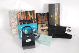 A box of perfumes, vanity boxes (unused)