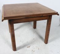 A 1930's Art Deco walnut refectory draw