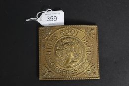 An unusual Tiffany belt buckle in brass