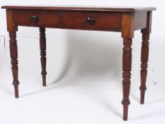 A Victorian writing table in mahogany st