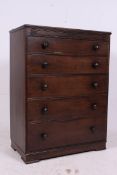 A 1930's Jacobean revival oak tall chest