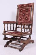 A Victorian walnut Boston rocking chair
