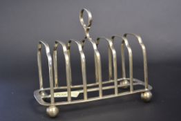A silver hallmarked toast rack of good p