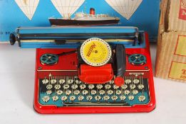 A boxed childrens Mettype tin plate type