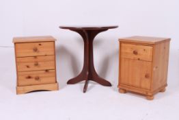 A contemporary pine bedside cabinet havi