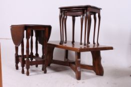 A large oak coffee table together with a