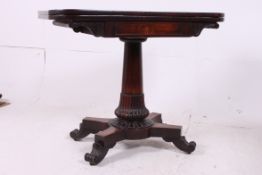 A 19th century Regency card table. Raise