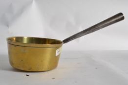 An early 20th century brass jam saucepan