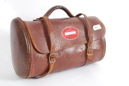 A vintage Leather sports bag bearing a m