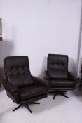 A Pair of retro 1970's swivel armchairs