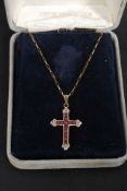 A 9ct gold crucifix necklace.