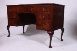 An Edwardian mahogany and leather writin