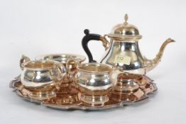 A 20th century silver salver together wi