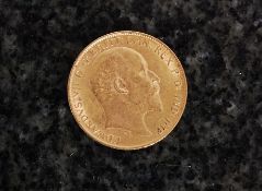 A Edward VII half sovereign coin dated 1