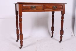 A late Victorian mahogany writing table