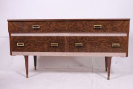 A vintage faux wood 1950's melamine low